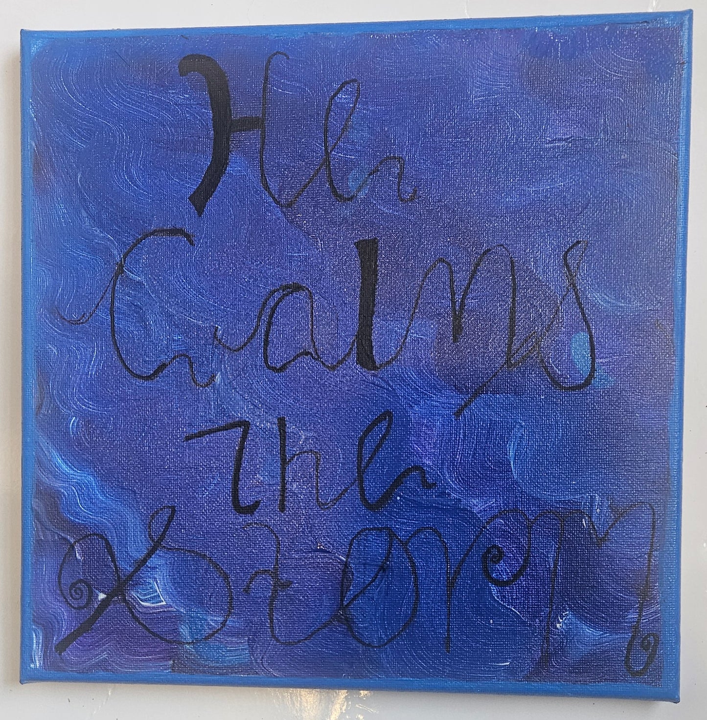 He calms the storm wall art